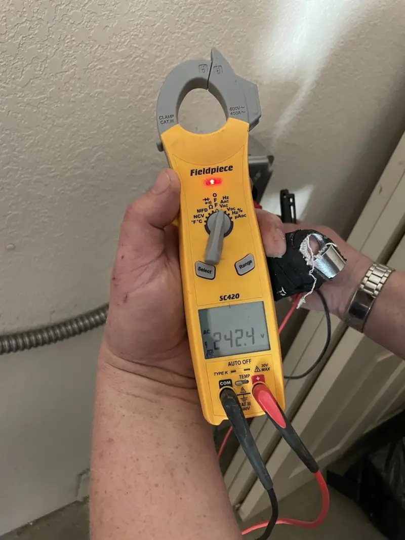 Voltage testing with clamp meter during Aluminum Wiring Replacement in Atascocita