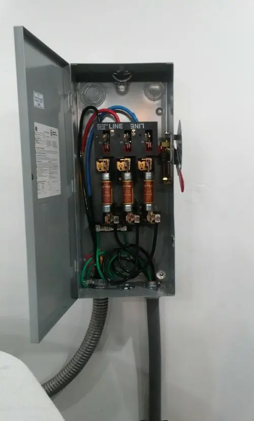 Three-phase disconnect switch installed for Smoke Detector Installation in Atascocita